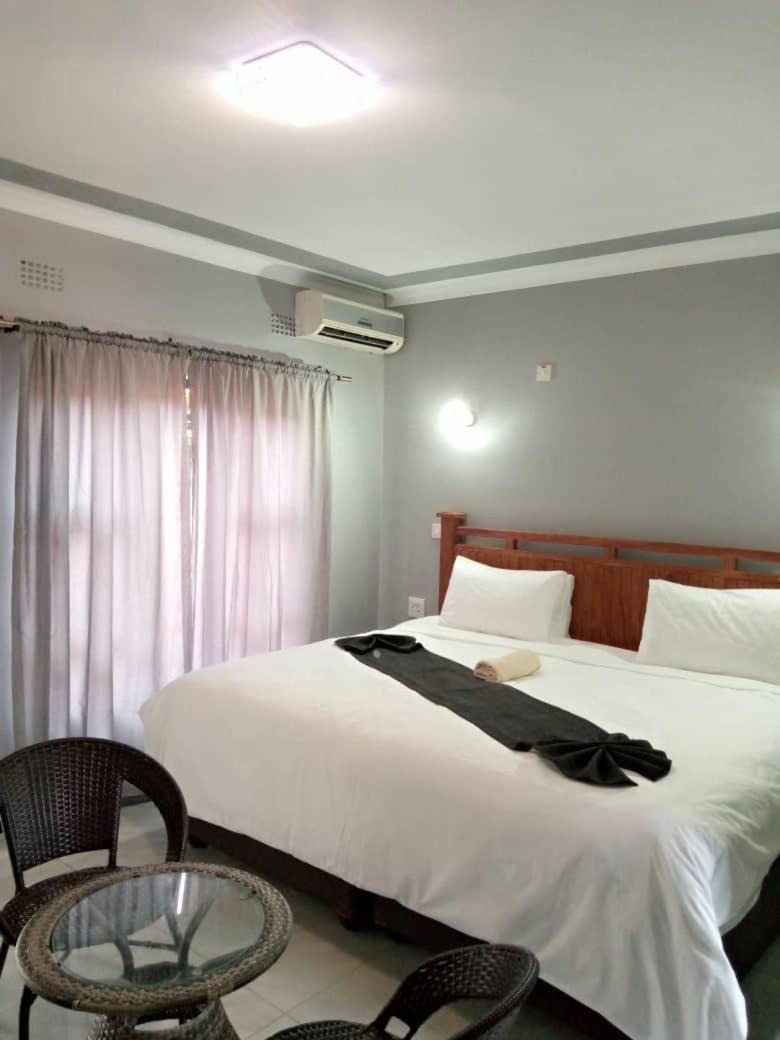 Global Guest House Касане Экстерьер фото